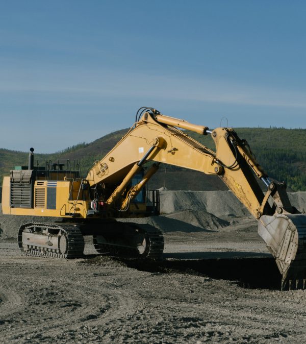 The work of an excavator at the site of gold mining. The work of an excavator at the site of gold mining.